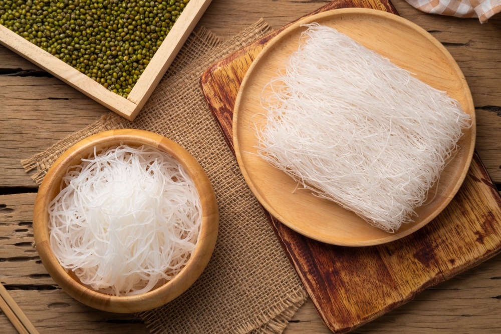 Fresh Glass Noodle in a Bowl and Dry Glass Noodle on Wooden Plate