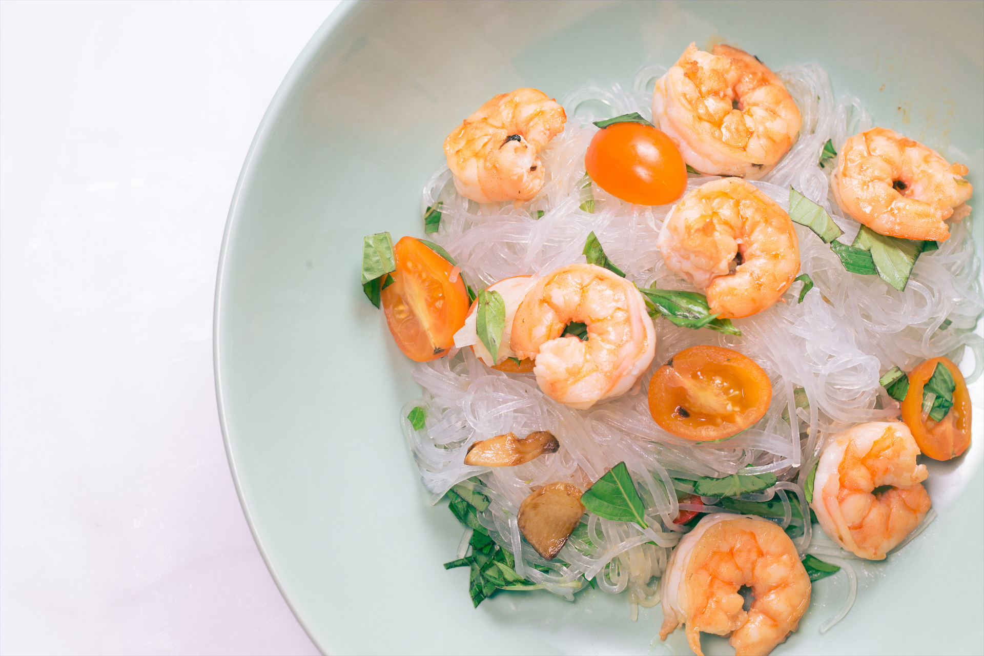 Spicy and sour glass noodles salad with fresh vegetables
